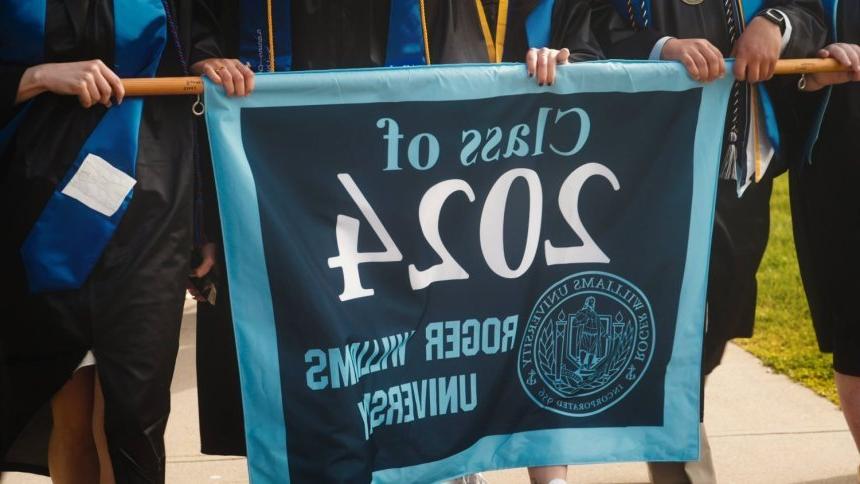 2024 Commencement Banner in Procession